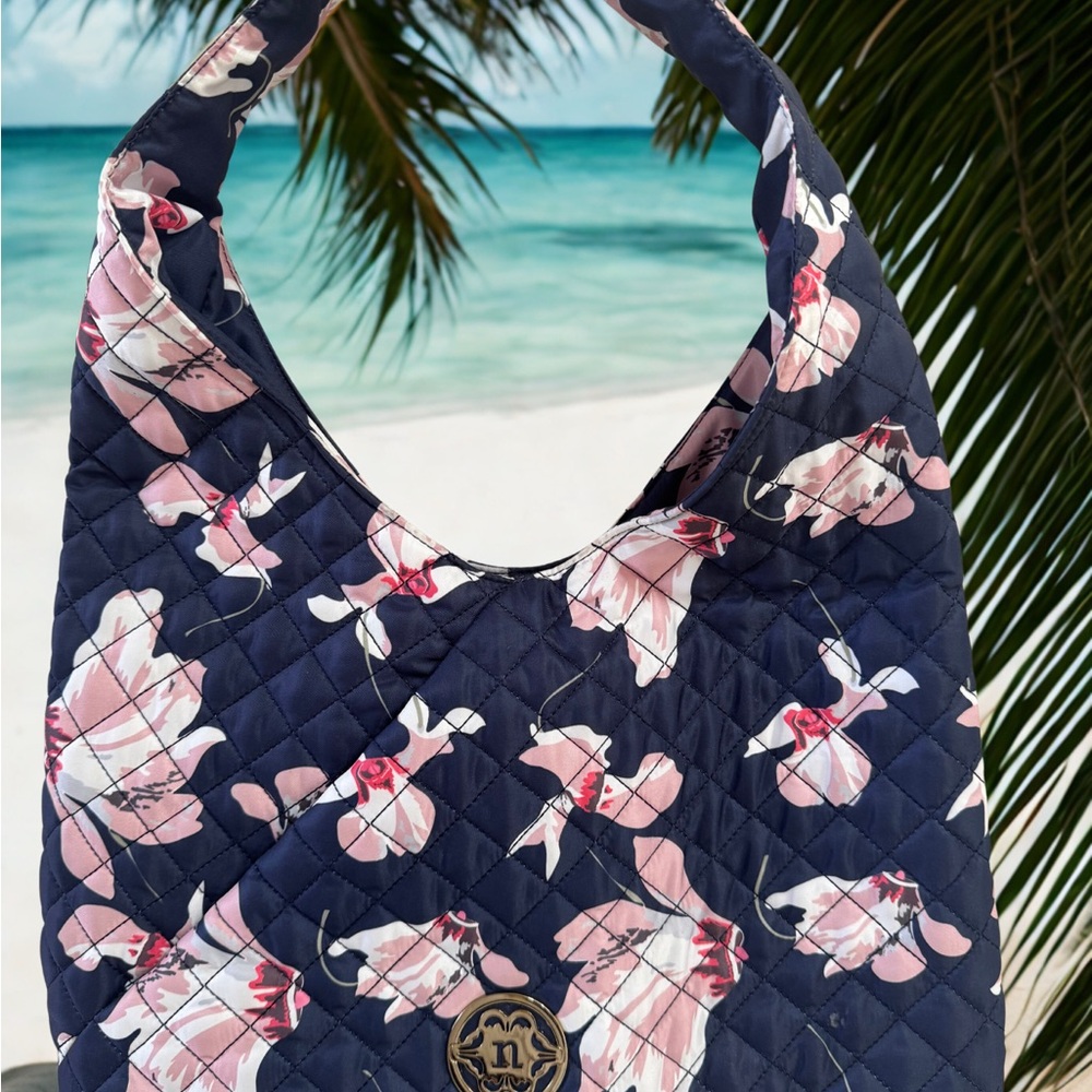 This is a Nanette Lepore Floral Print Washable Knot Hobo Bag in Navy Blossom